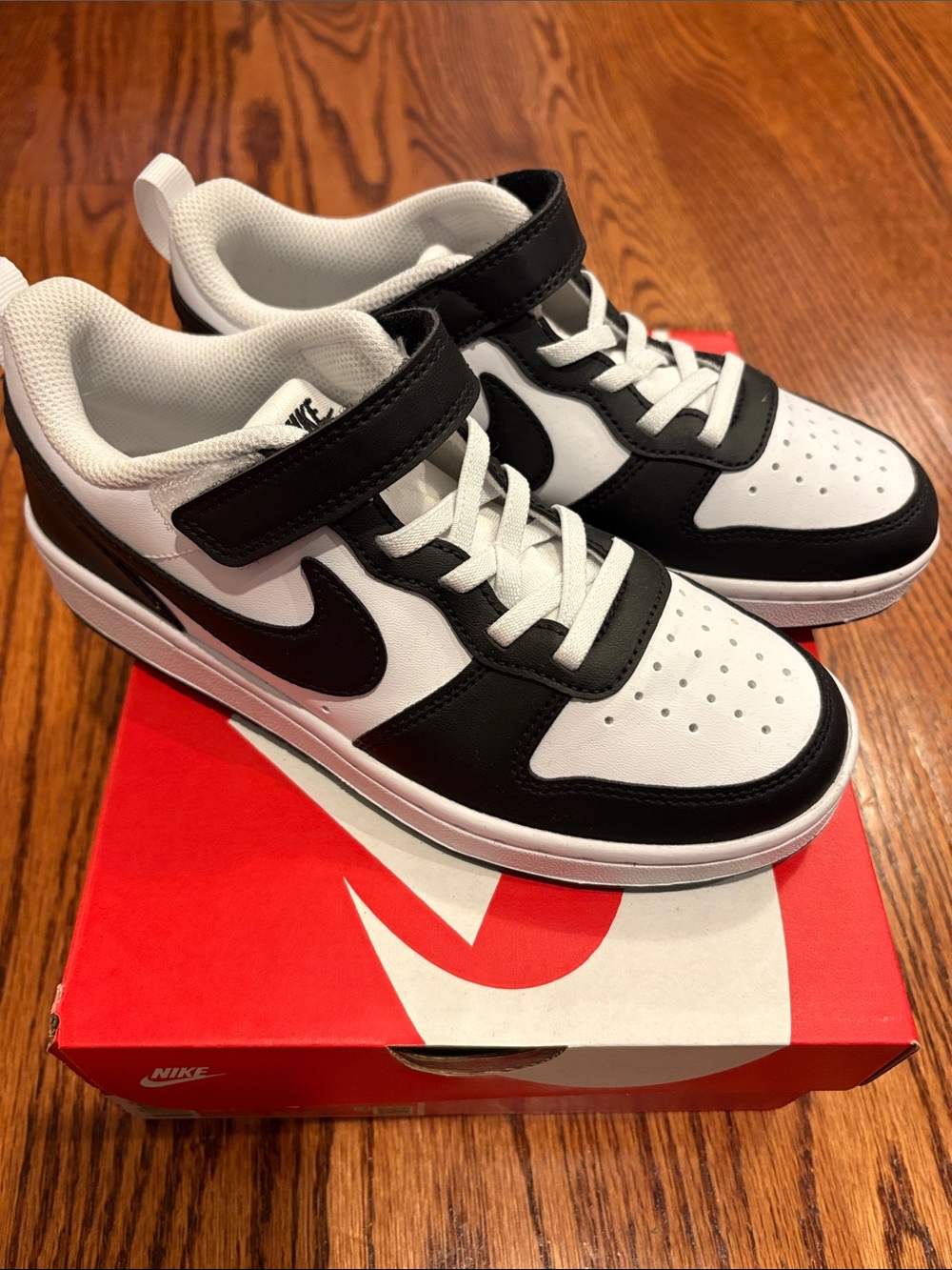 Nike Kids White and Black Low-Top Sneaker with Hook-and-Loop Strap
